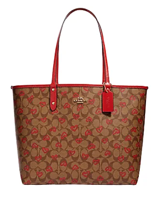 Festive Holiday Gift Bags Coach Reversible City Tote in Signature Canvas With Crayon Heart Print