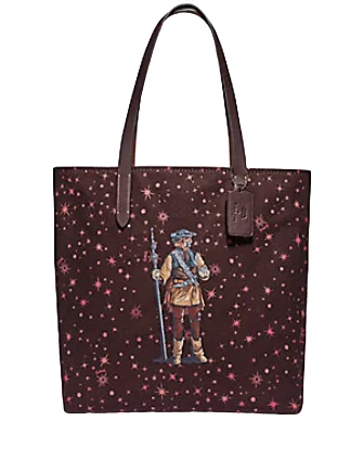 Functional Bags For Busy Moms And Dads Coach Star Wars X Tote With Starry Print and Princess Leia as Boushh