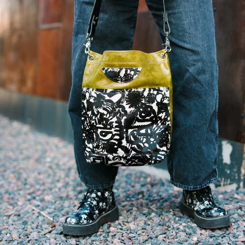 Bags For Urban And Trendy Looks Urban Edge Collection | Train Shoulder Tote + Crossbody | Olive Leaf + Newsprint Hair-on-Hide