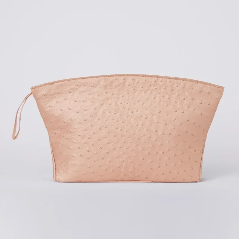 Compact Bags For Minimalist Travelers Blake Large Champagne Ostrich Clutch