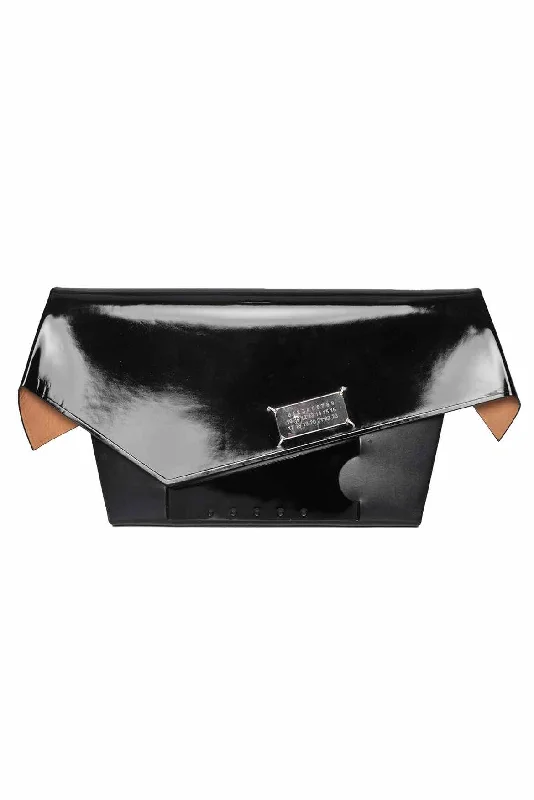 Inspired Bags For Luxury Fashion Lovers Maison Martin Margiela Large Snatched Clutch