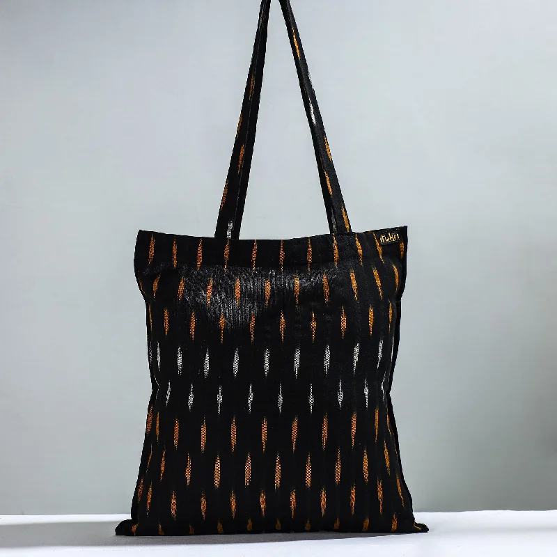 Edgy Bags For Bold And Daring Fashionistas Black - Handcrafted Pochampally Ikat Weave Cotton Jhola Bag